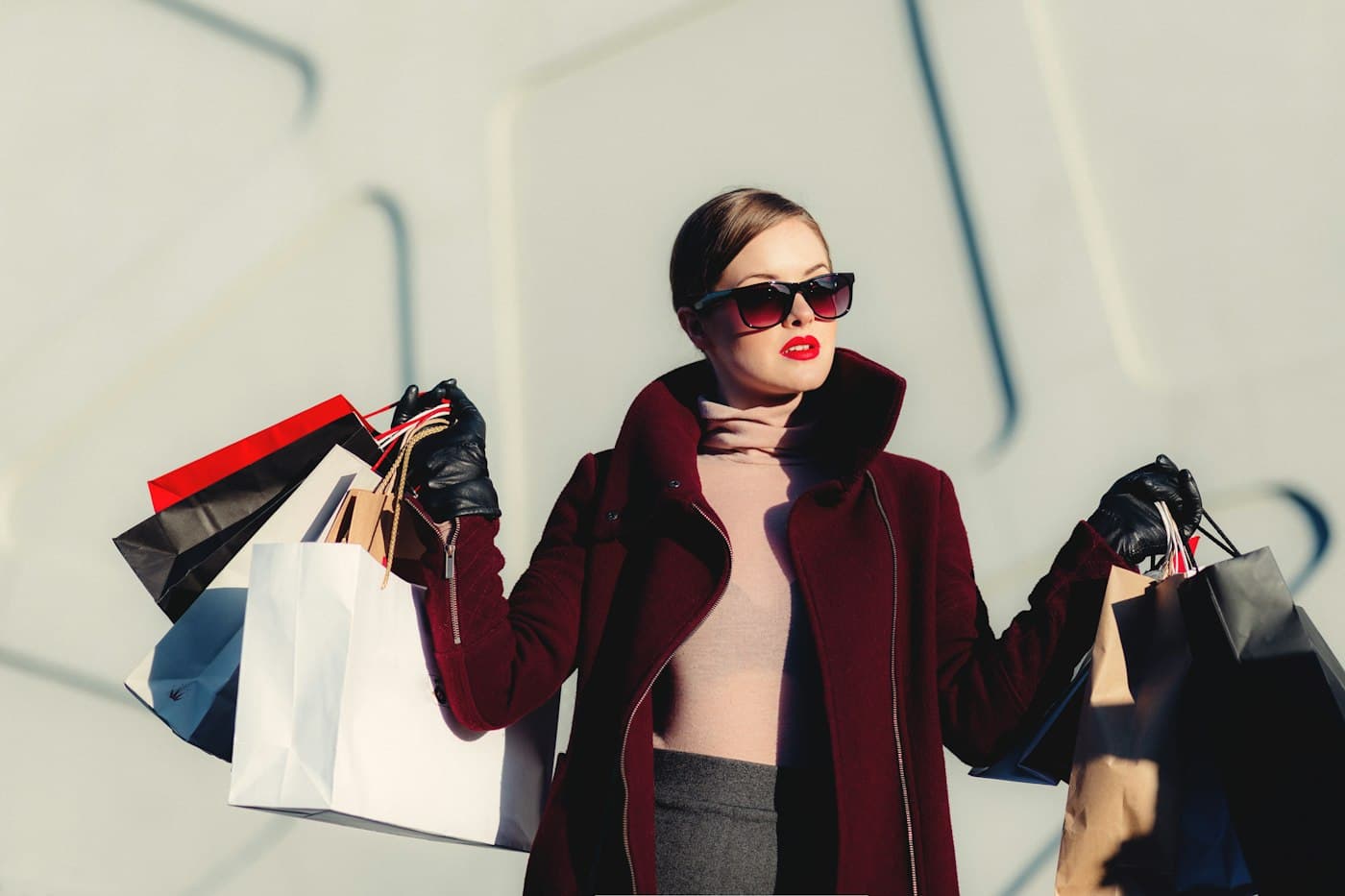 Shopper carrying bags of clothing